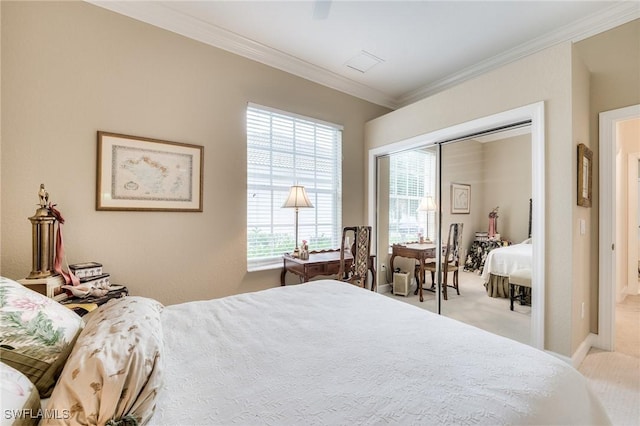 bedroom featuring ceiling fan, ornamental molding, and light carpet