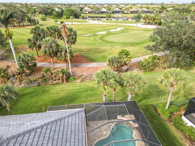 exterior space featuring a water view and a swimming pool