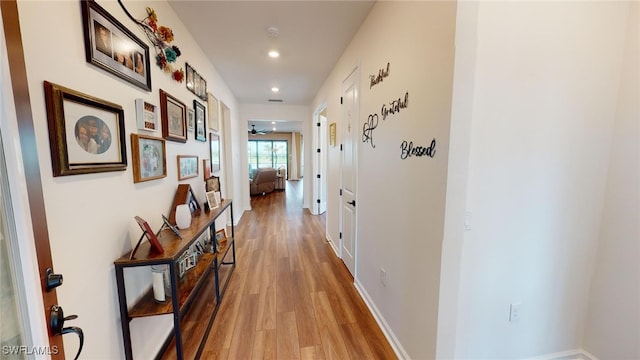 corridor featuring light hardwood / wood-style flooring