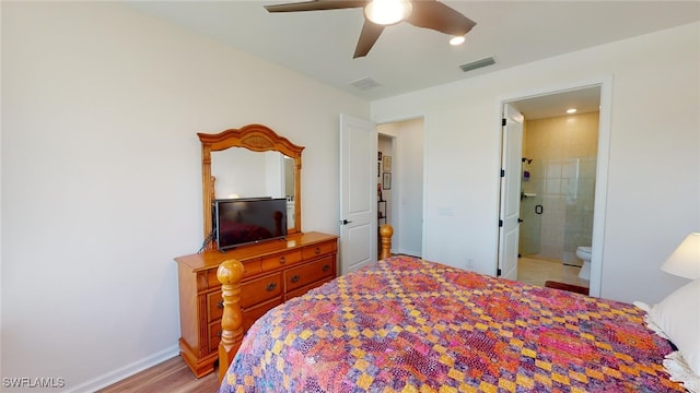 bedroom featuring light wood-type flooring, connected bathroom, and ceiling fan