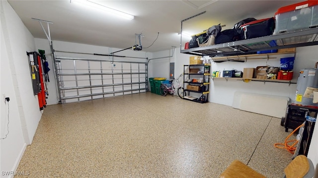 garage featuring a garage door opener and electric panel