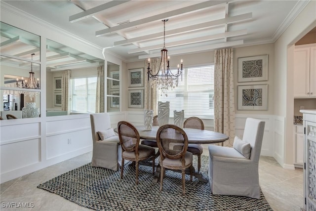 dining space featuring a chandelier, beamed ceiling, ornamental molding, and light tile patterned floors