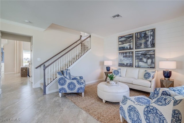 tiled living room featuring ornamental molding