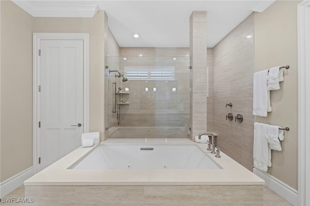 full bath with a tub with jets, a tile shower, and baseboards