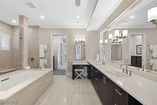 bathroom with vanity, a healthy amount of sunlight, crown molding, and plus walk in shower