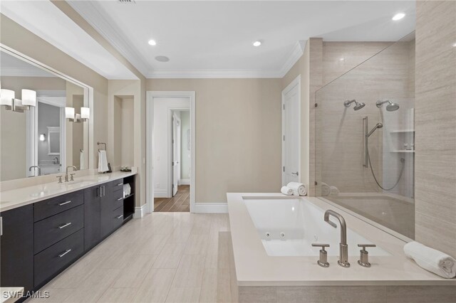 bathroom with shower with separate bathtub, vanity, and crown molding