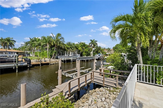 view of dock featuring a water view and boat lift