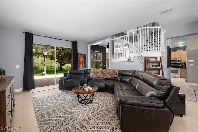 living room featuring light tile patterned floors