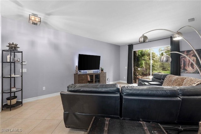 living room with light tile patterned floors