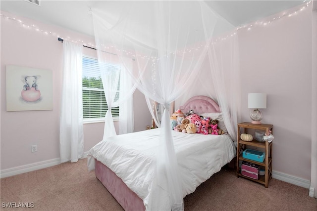 bedroom featuring carpet