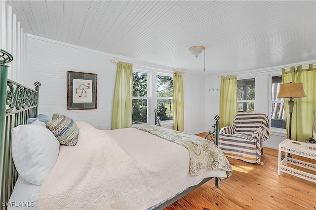 bedroom featuring wood-type flooring