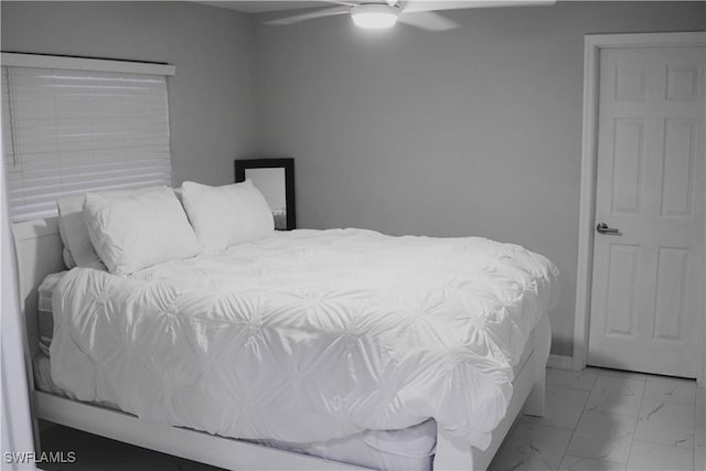 bedroom featuring ceiling fan