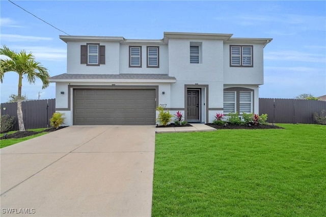 view of front facade featuring a garage and a front yard