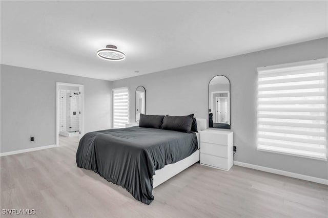 bedroom featuring light hardwood / wood-style floors