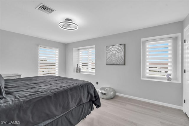 bedroom featuring light hardwood / wood-style floors