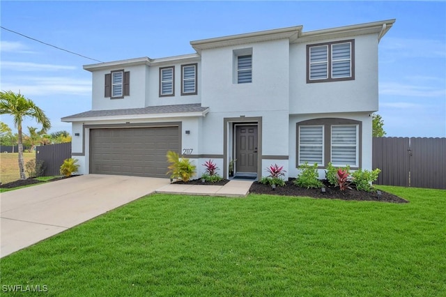 view of front of property with a garage and a front yard