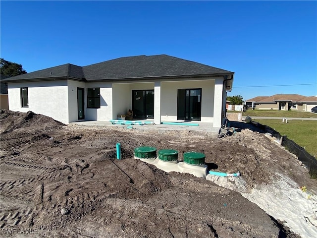 back of house with a patio area