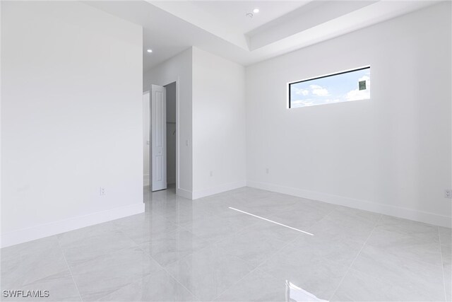 3005 28th St SW, Lehigh Acres, FL 33976 - spare room with recessed lighting and baseboards