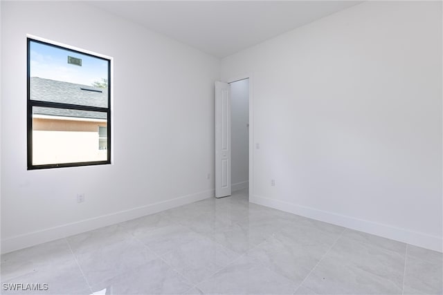 3005 28th St SW, Lehigh Acres, FL 33976 - unfurnished room featuring baseboards