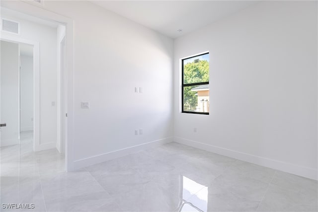 3005 28th St SW, Lehigh Acres, FL 33976 - empty room featuring baseboards