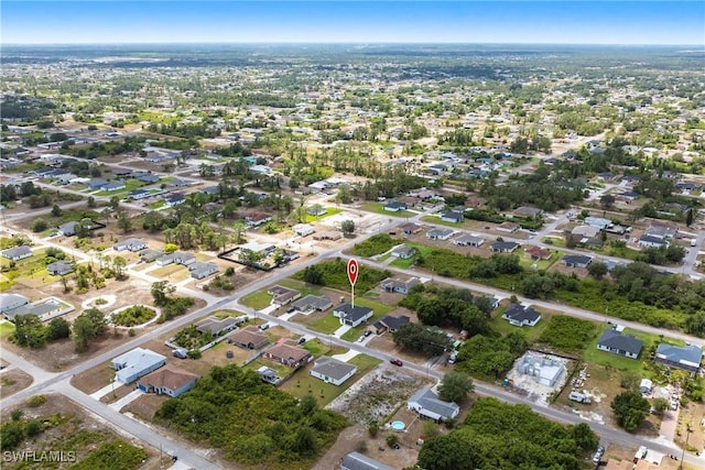3005 28th St SW, Lehigh Acres, FL 33976 - aerial overview of property's location featuring nearby suburban area