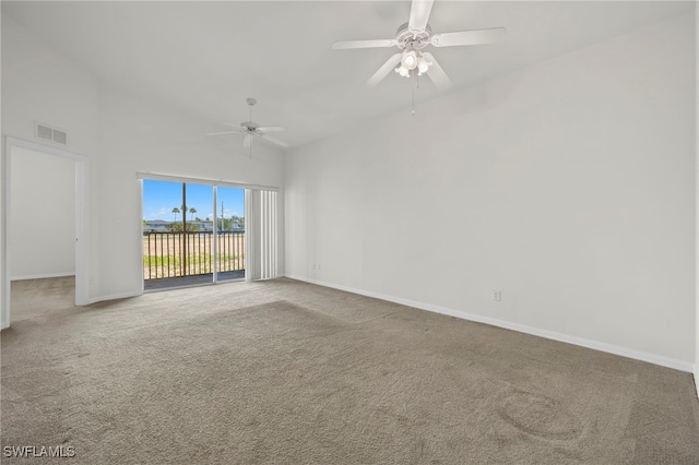 carpeted empty room featuring ceiling fan