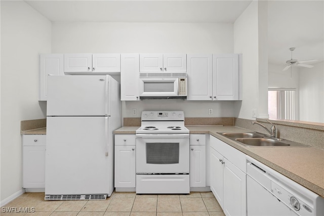 kitchen featuring sink, white cabinetry, light tile patterned floors, ceiling fan, and white appliances