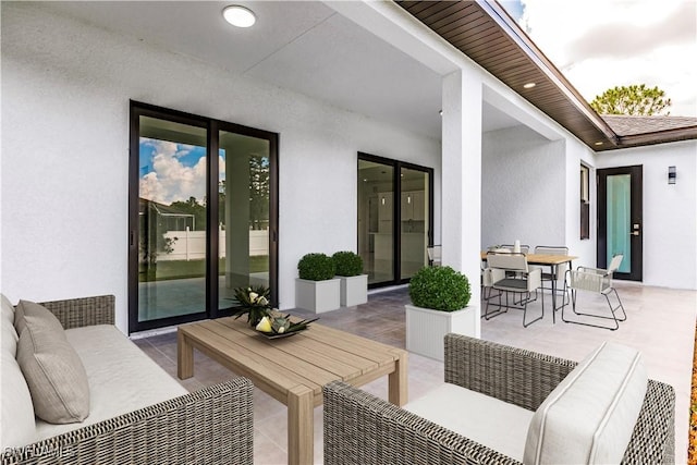 view of patio featuring outdoor dining area and outdoor lounge area
