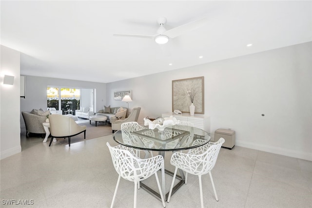 dining space featuring ceiling fan