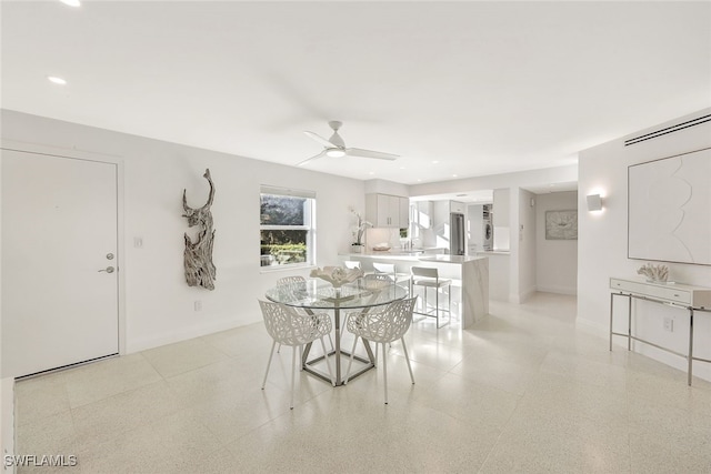 dining area featuring ceiling fan