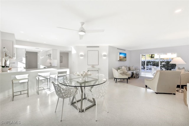 dining area with ceiling fan