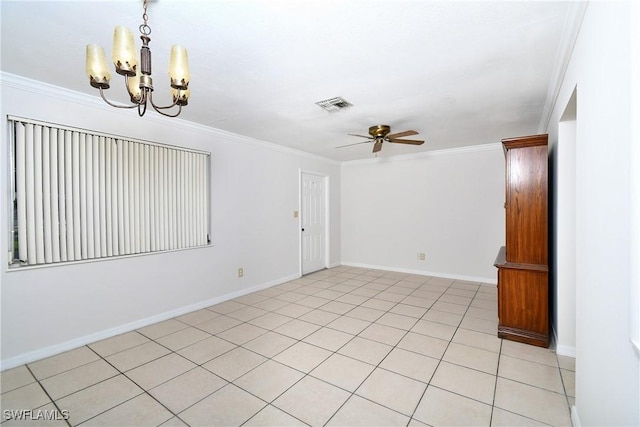 empty room featuring ceiling fan with notable chandelier, light tile patterned floors, and ornamental molding