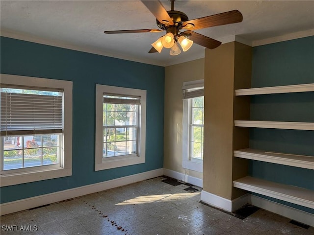 unfurnished room featuring ceiling fan