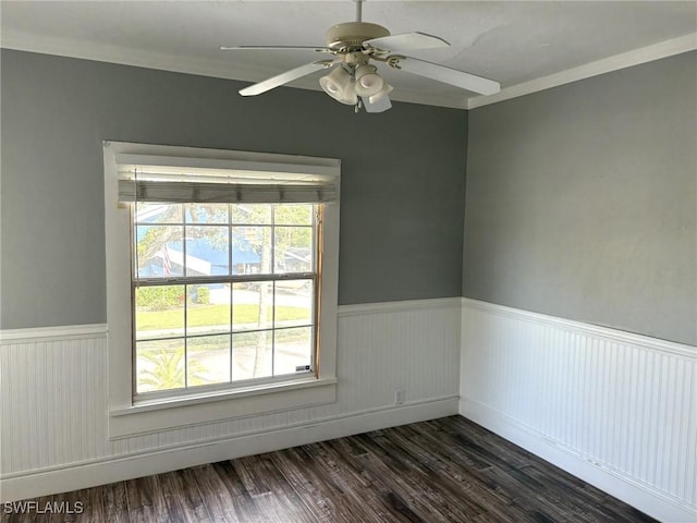 empty room with ceiling fan and dark hardwood / wood-style floors