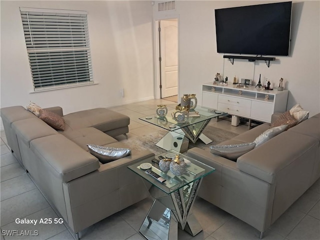 living room featuring light tile patterned floors