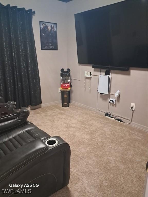 home theater room featuring carpet