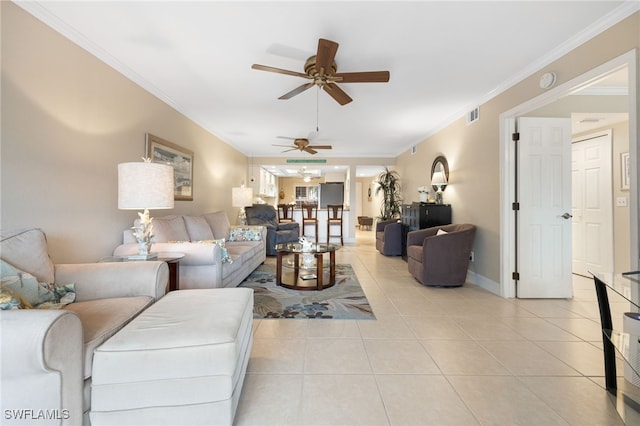 902 SW 48th Ter Unit 104, Cape Coral, FL 33914 - living area with ceiling fan, light tile patterned floors, ornamental molding, and baseboards