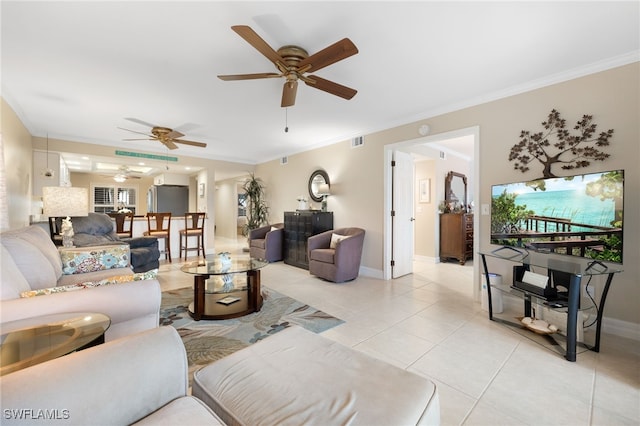 902 SW 48th Ter Unit 104, Cape Coral, FL 33914 - living area featuring ceiling fan, light tile patterned floors, crown molding, and baseboards