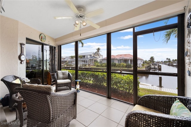 902 SW 48th Ter Unit 104, Cape Coral, FL 33914 - sunroom / solarium featuring a water view, a ceiling fan, and plenty of natural light