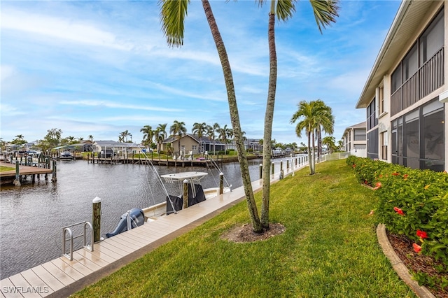 902 SW 48th Ter Unit 104, Cape Coral, FL 33914 - dock area featuring a water view, a yard, and a residential view