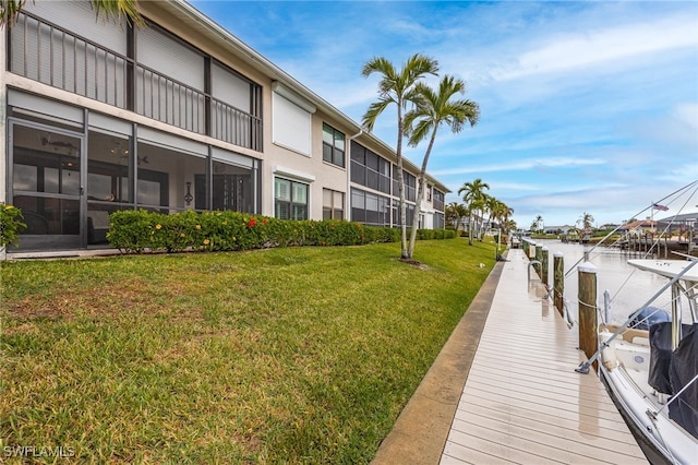 902 SW 48th Ter Unit 104, Cape Coral, FL 33914 - view of property's community featuring a lawn