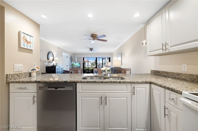 902 SW 48th Ter Unit 104, Cape Coral, FL 33914 - kitchen featuring dishwasher, a sink, white cabinetry, ceiling fan, and a peninsula