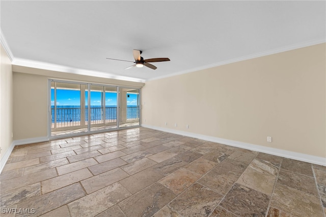 spare room featuring crown molding, a water view, and ceiling fan