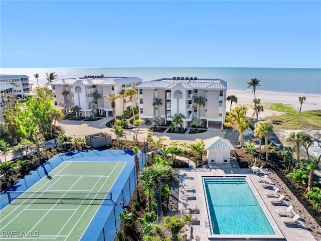 drone / aerial view with a view of the beach and a water view