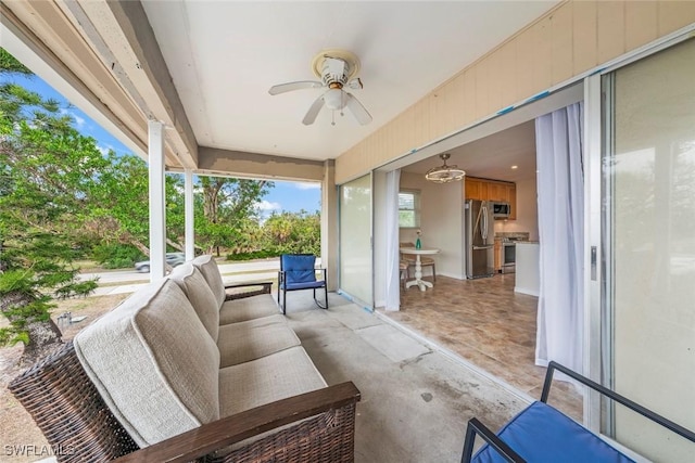 view of patio / terrace with ceiling fan and an outdoor hangout area