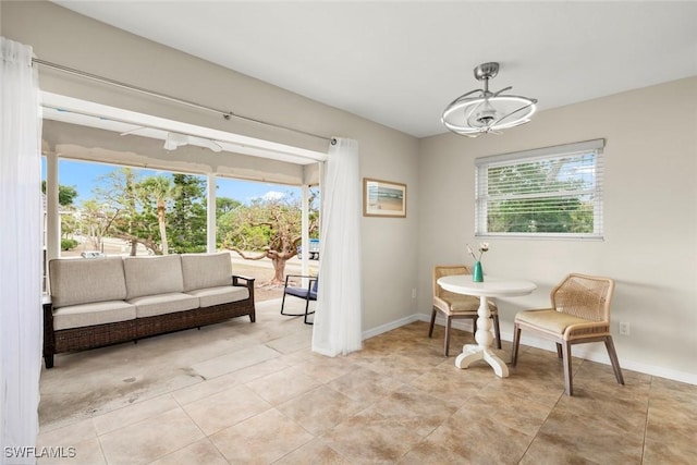 sitting room featuring light tile patterned floors