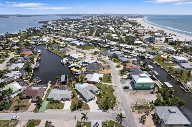 drone / aerial view with a water view