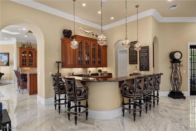 2704 Shriver Dr, Fort Myers, FL 33901 - bar featuring visible vents, baseboards, ornamental molding, decorative light fixtures, and marble finish floor