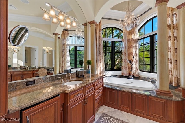 2704 Shriver Dr, Fort Myers, FL 33901 - full bath with marble finish floor, a notable chandelier, ornamental molding, ornate columns, and a bath