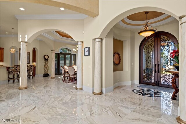 2704 Shriver Dr, Fort Myers, FL 33901 - entryway with baseboards, marble finish floor, french doors, decorative columns, and crown molding